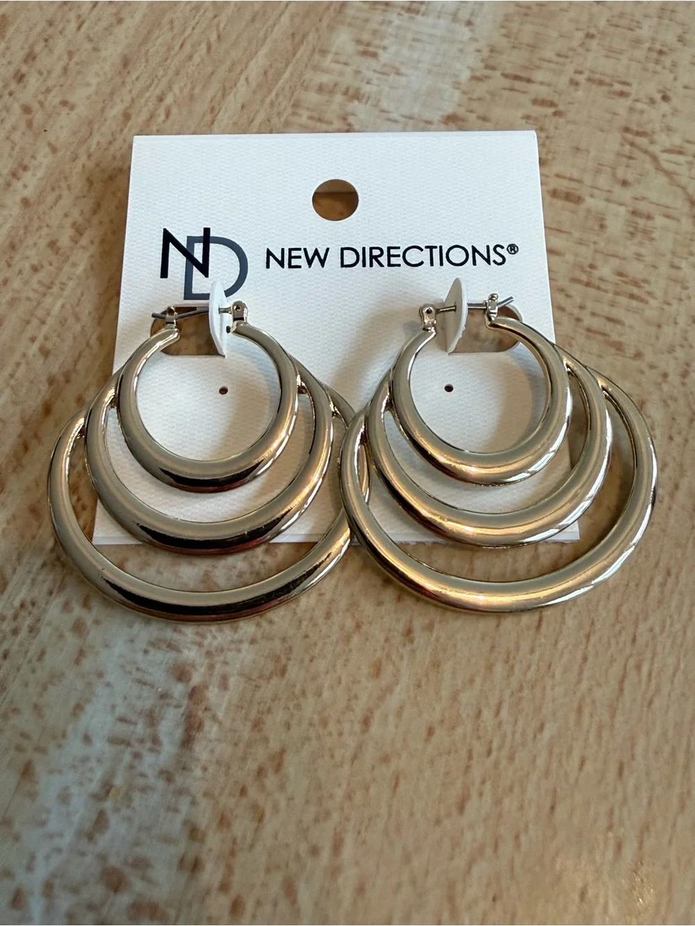 NWT. New Directions. Triple Layer Silver Hoops.